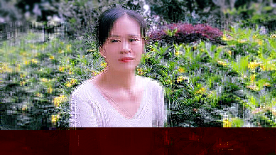 周喜梅.jpg